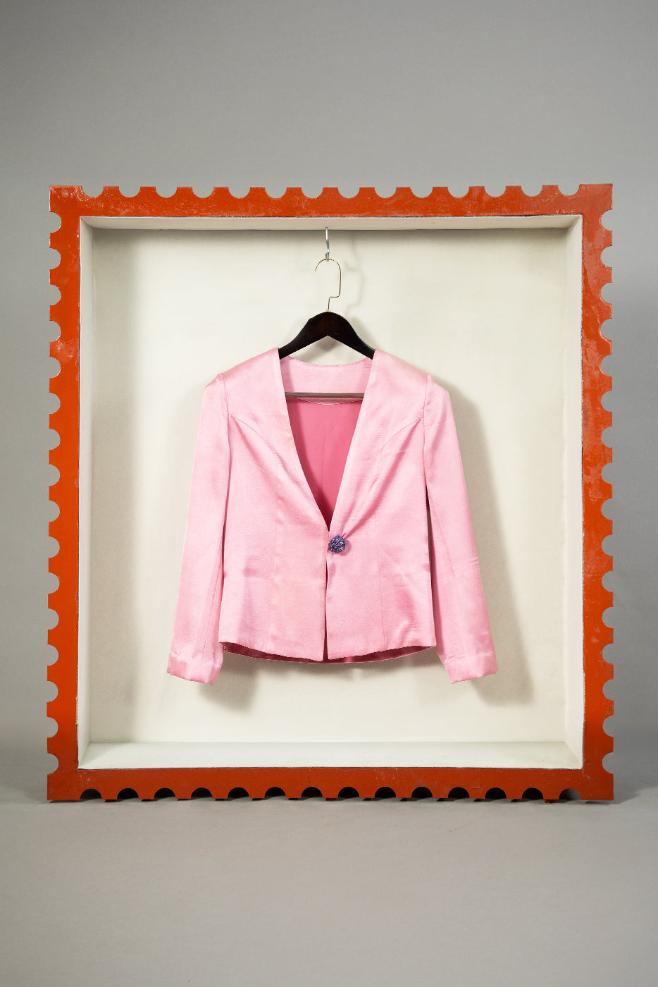 Blazer with floral button