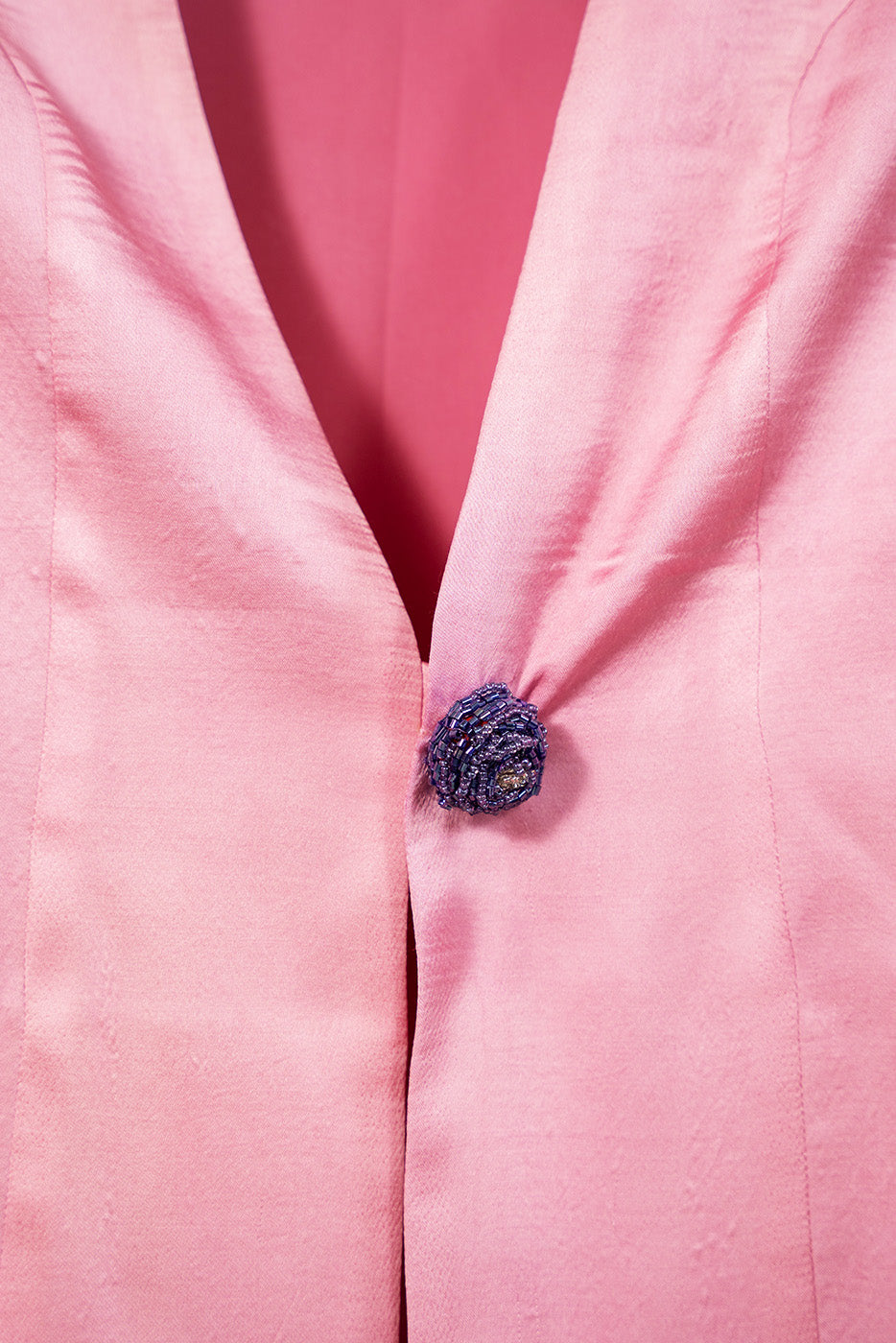 Blazer with floral button